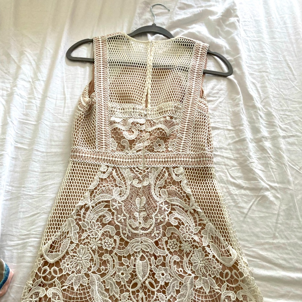 Dress cream color with nude background